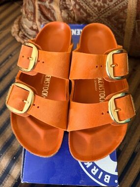 Birkenstock Orange Double-Strap Sandals with Gold Buckles